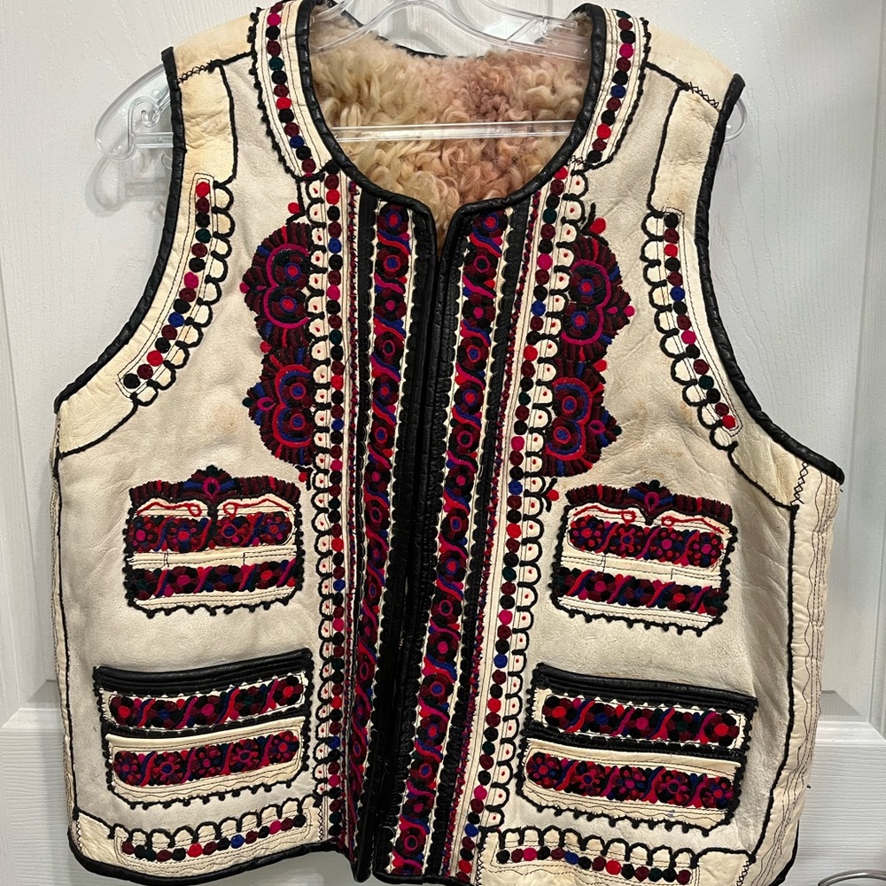 Vintage Native sheep wool shearling vest with embroidered leather and pockets.
